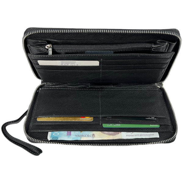 Стильный мужской портмоне из натуральной кожи и 5 отделами для купюр Стильный мужской портмоне из натуральной кожи и 5 отделами для купюр