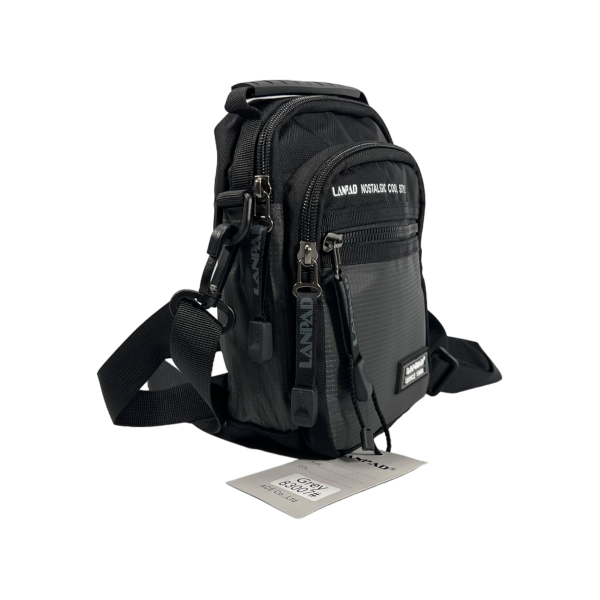 Сумка-барсетка через плечо из текстиля, три отделения, серая Сумка-барсетка через плечо из текстиля, три отделения, серая