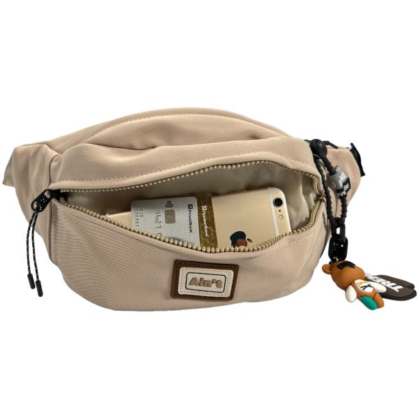 Сумка бананка бежевого цвета на два отделения Сумка бананка бежевого цвета на два отделения